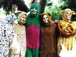 A group of animal characters (dalmatian, tiger, dinosaur, bear and kangaroo)