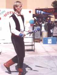 Donovan the juggler juggles with clubs